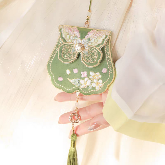 Portable embroidered sachet
