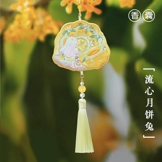 Portable embroidered sachet