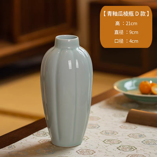Small ceramic vase with celadon glaze, imitation Song dynasty style, a tabletop ornament with a Zen aesthetic, made in Jingdezhen, China.