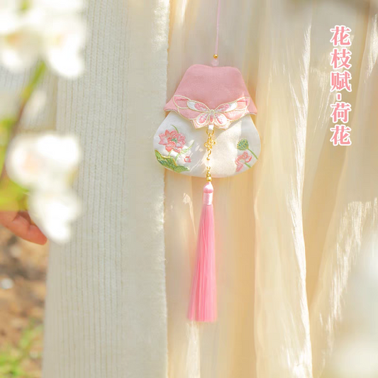 Portable embroidered sachet
