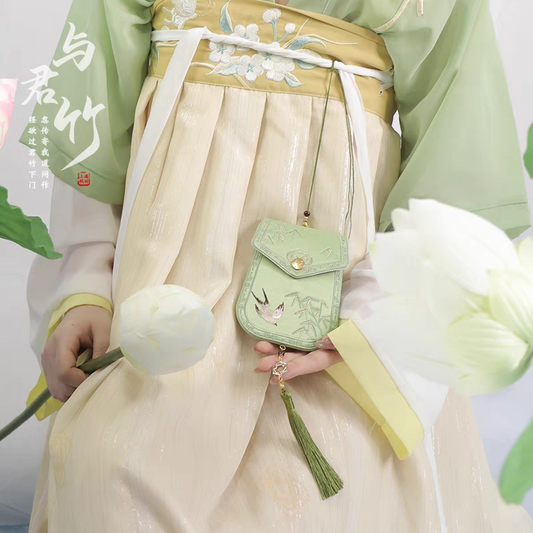 Portable embroidered sachet