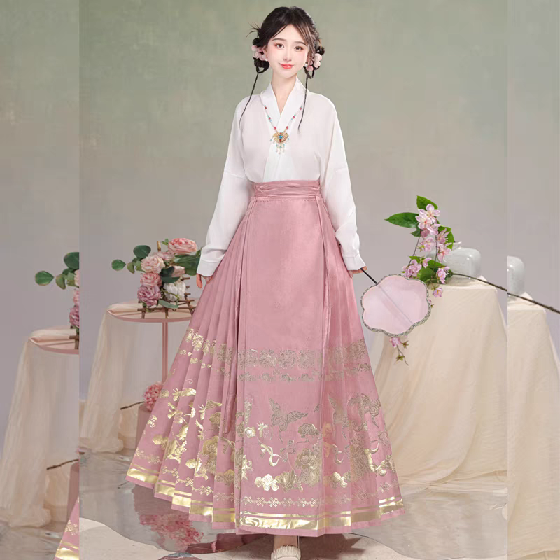 Matching candy-colored woven gold-embroidered horse-face skirt (cross-collar top + horse-face skirt)