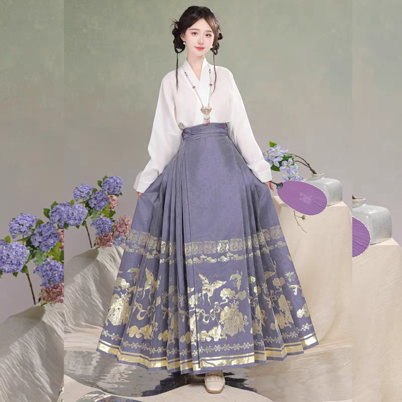 Matching candy-colored woven gold-embroidered horse-face skirt (cross-collar top + horse-face skirt)