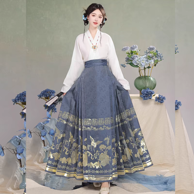 Matching candy-colored woven gold-embroidered horse-face skirt (cross-collar top + horse-face skirt)